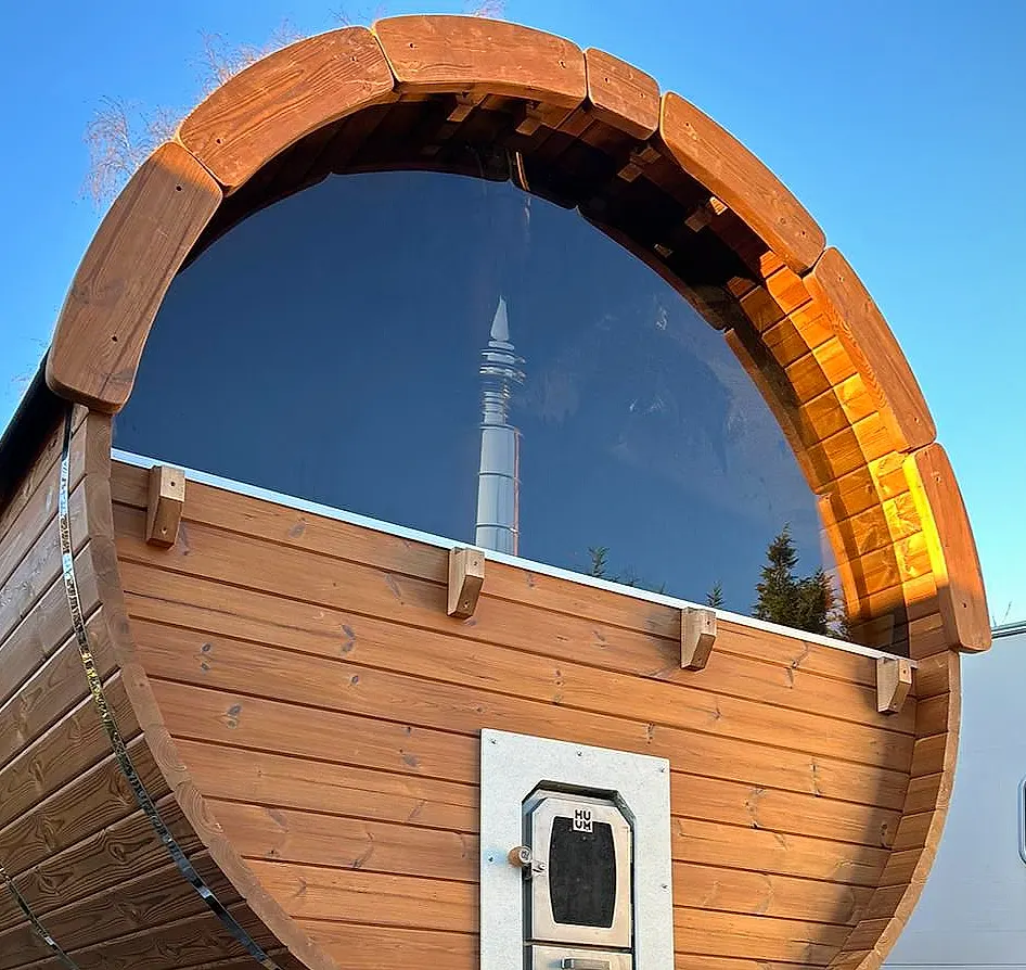 Barrel sauna round window and sauna heater